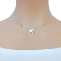 Double heart cubic zirconia necklace with mother of pearl pendant on rhodium-plated chain