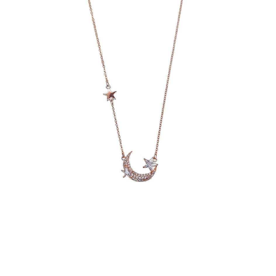 Moon and star cubic zirconia necklace in rosegold plated finish with adjustable chain and spring clasp