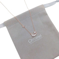 Moon and Star Cubic Zirconia Necklace in Rosegold with adjustable chain and sparkling celestial pendants