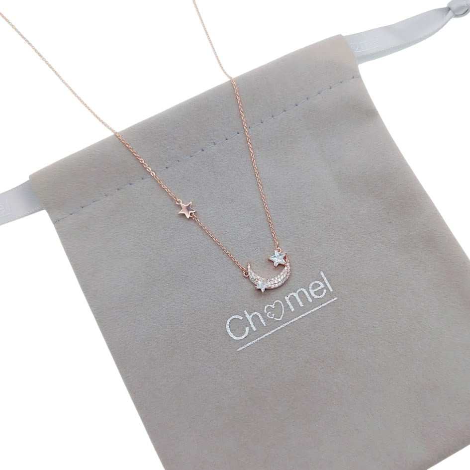 Moon and Star Cubic Zirconia Necklace in Rosegold with adjustable chain and sparkling celestial pendants