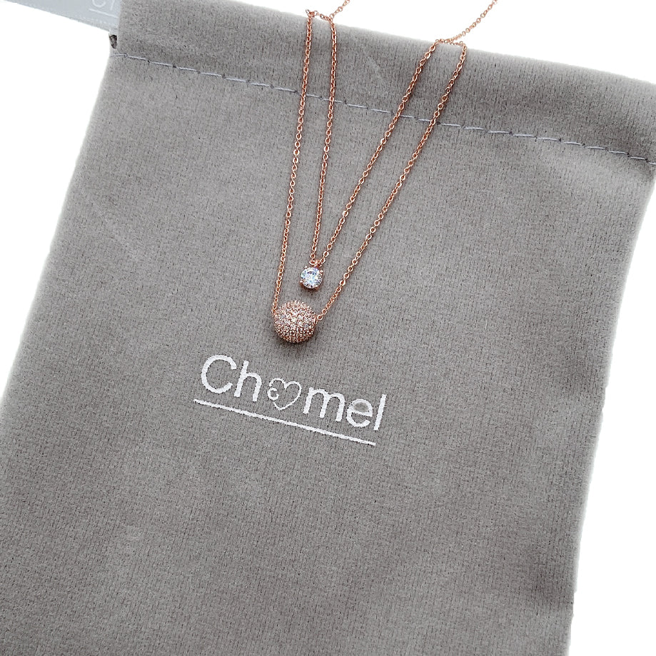 Rose gold layered heart cubic zirconia necklace with 4mm solitaire and 8mm CZ ball pendants
