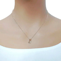 Rosegold plated Lock & Key Cubic Zirconia Necklace with star and butterfly pendants and 3 moveable slider rings