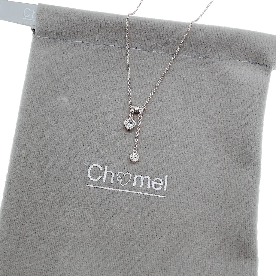 Cubic Zirconia Necklace with adjustable slider rings and heart solitaire pendants in rhodium finish