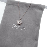 Spinning flower necklace with cubic zirconia pendant on adjustable rhodium plated chain