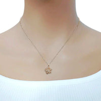 Rosegold flower necklace with spinning cubic zirconia pendant on delicate chain