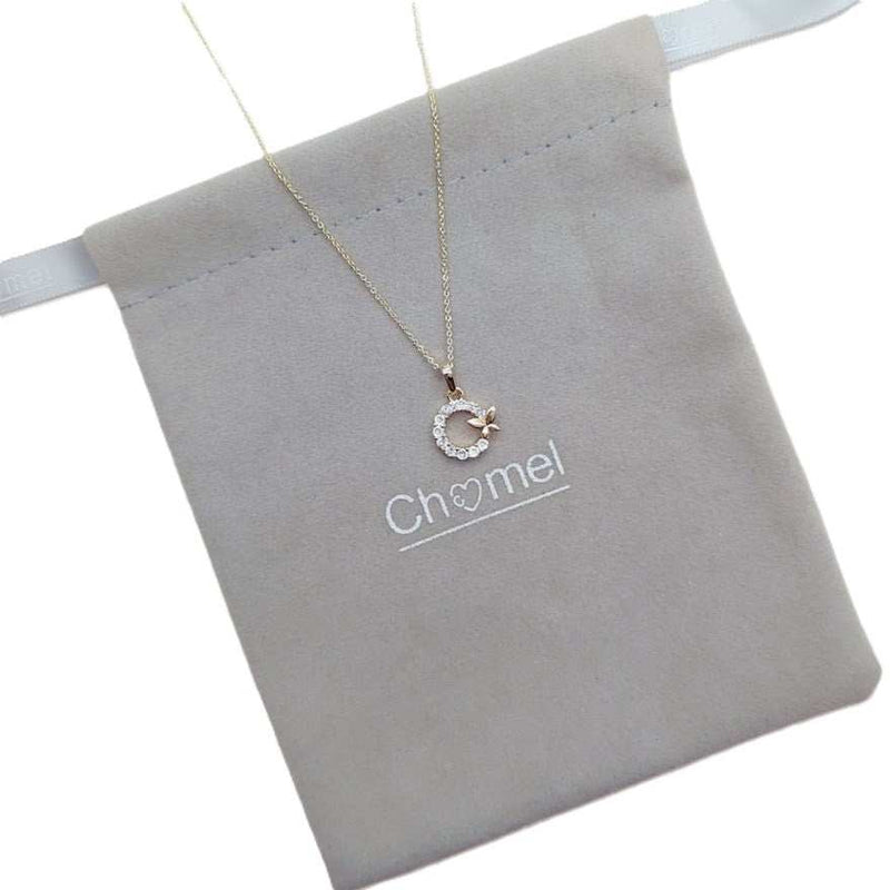 Gold plated butterfly cubic zirconia necklace with circle pendant on adjustable chain