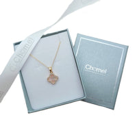 Clover pendant necklace in gold-toned metal with a sparkling stone border; Butterfly Cubic Zirconia design on a fine chain.