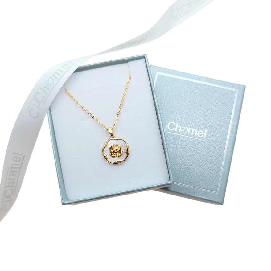 Gold-plated flower pendant necklace with a round white center and delicate chain; Butterfly Cubic Zirconia detail.