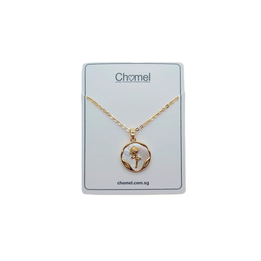 Gold-toned necklace with a round pendant featuring a raised flower and curved border, styled as Butterfly Cubic Zirconia.
