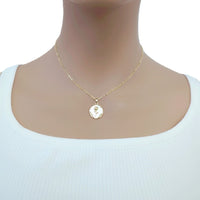 Gold-plated necklace with a round white mother-of-pearl pendant and delicate floral detail, Butterfly Cubic Zirconia design.