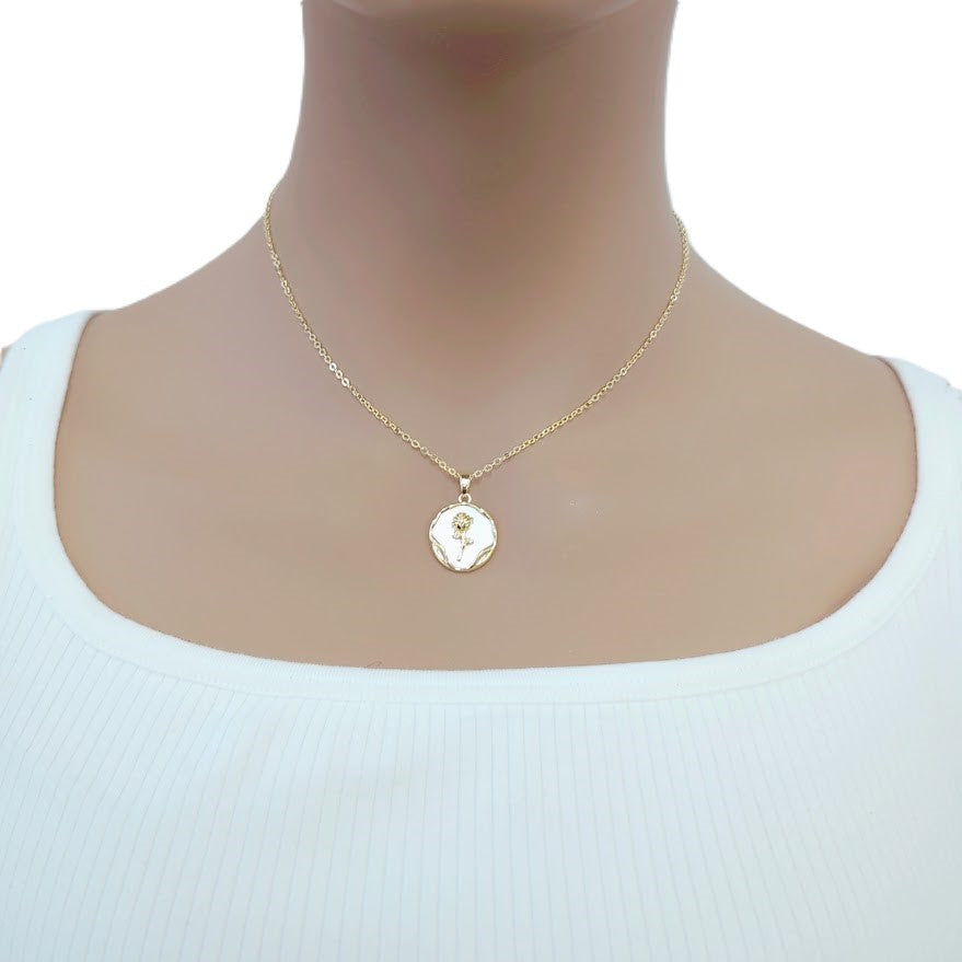 Gold-plated necklace with a round white mother-of-pearl pendant and delicate floral detail, Butterfly Cubic Zirconia design.