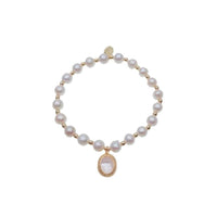 Freshwater pearl bracelet with gold beads and oval simulated moonstone charm on elastic band