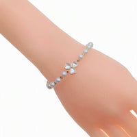 Freshwater pearl bracelet with gold beads and simulated moonstone clover centerpiece