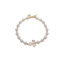 Freshwater pearl bracelet with gold beads and three-leaf clover moonstone centerpiece