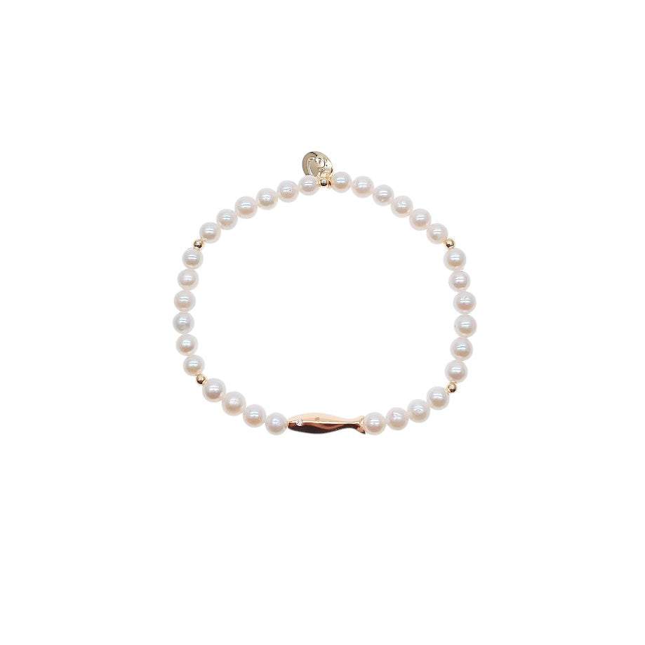 Freshwater pearl bracelet with alternating gold beads and gold fish charm on elastic band