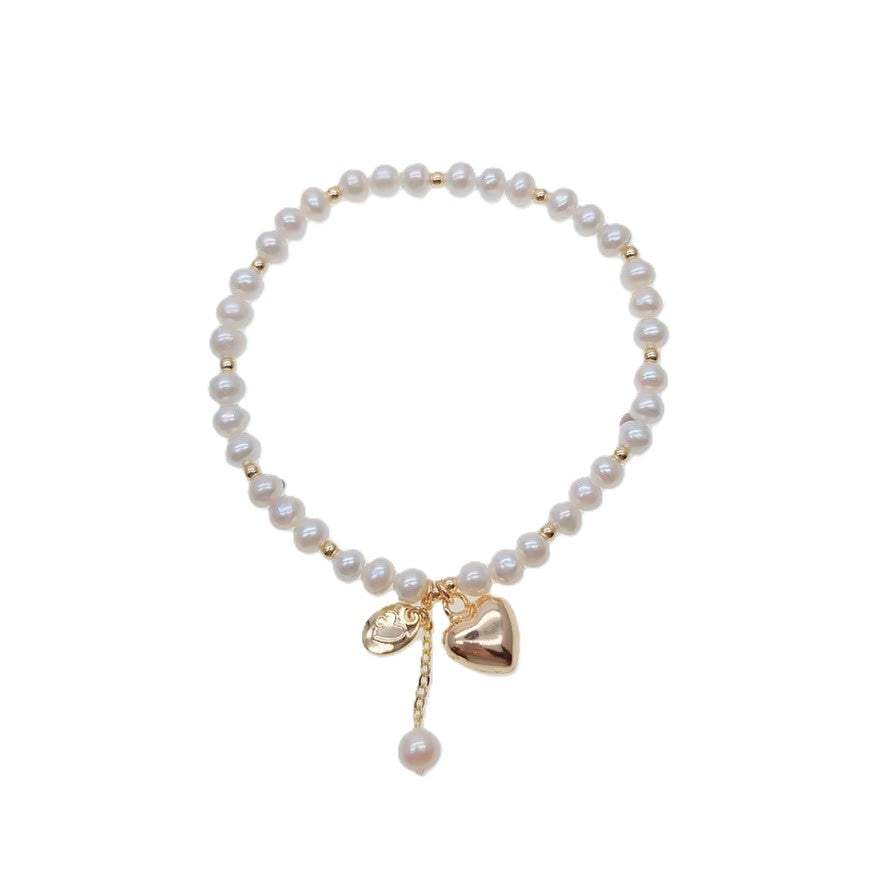 Freshwater pearl bracelet with alternating gold beads and heart charm on elastic band