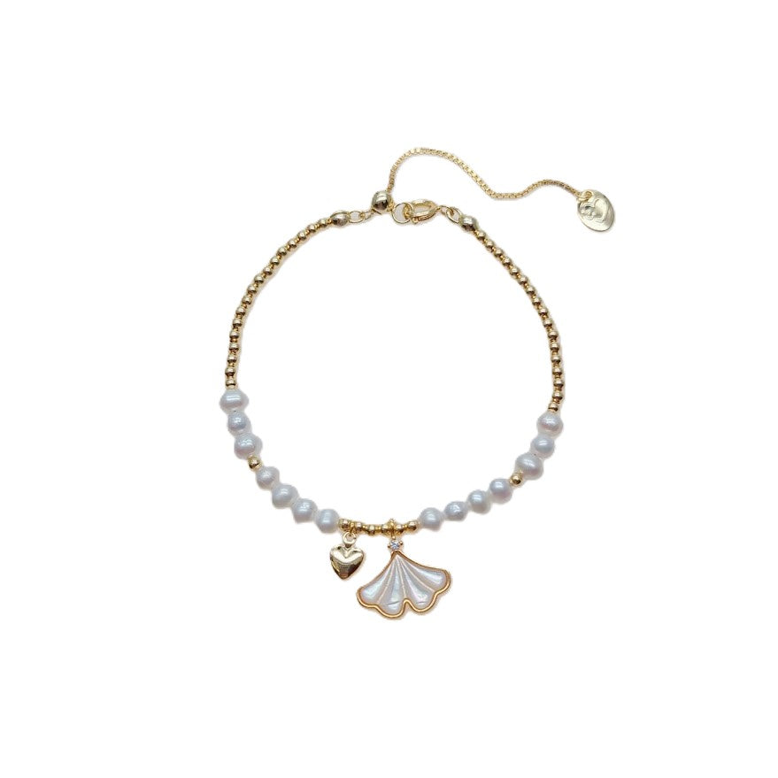 Freshwater Pearl Bracelet with white 4mm pearls, gold beads, and gold-plated ginkgo leaf and heart charms
