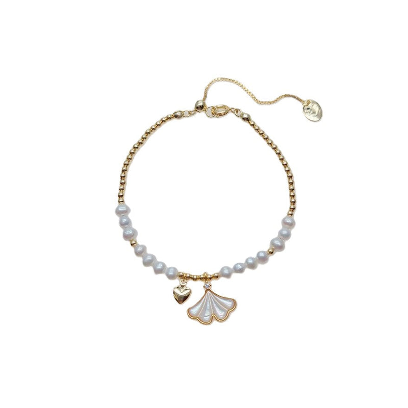 Freshwater Pearl Bracelet with white 4mm pearls, gold beads, and gold-plated ginkgo leaf and heart charms