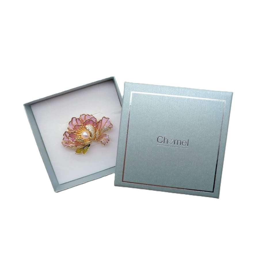 Gold plated flower freshwater pearl brooch with lilac enamel petals and cubic zirconia stones