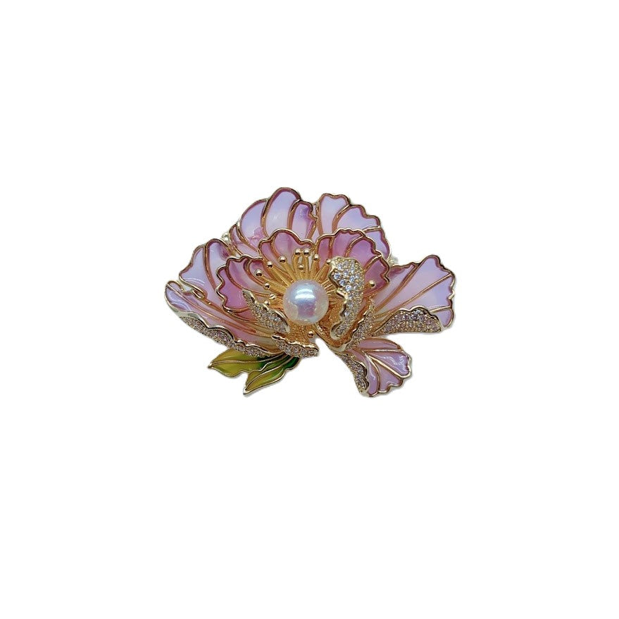 Gold plated flower freshwater pearl brooch with lilac enamel petals and cubic zirconia stones