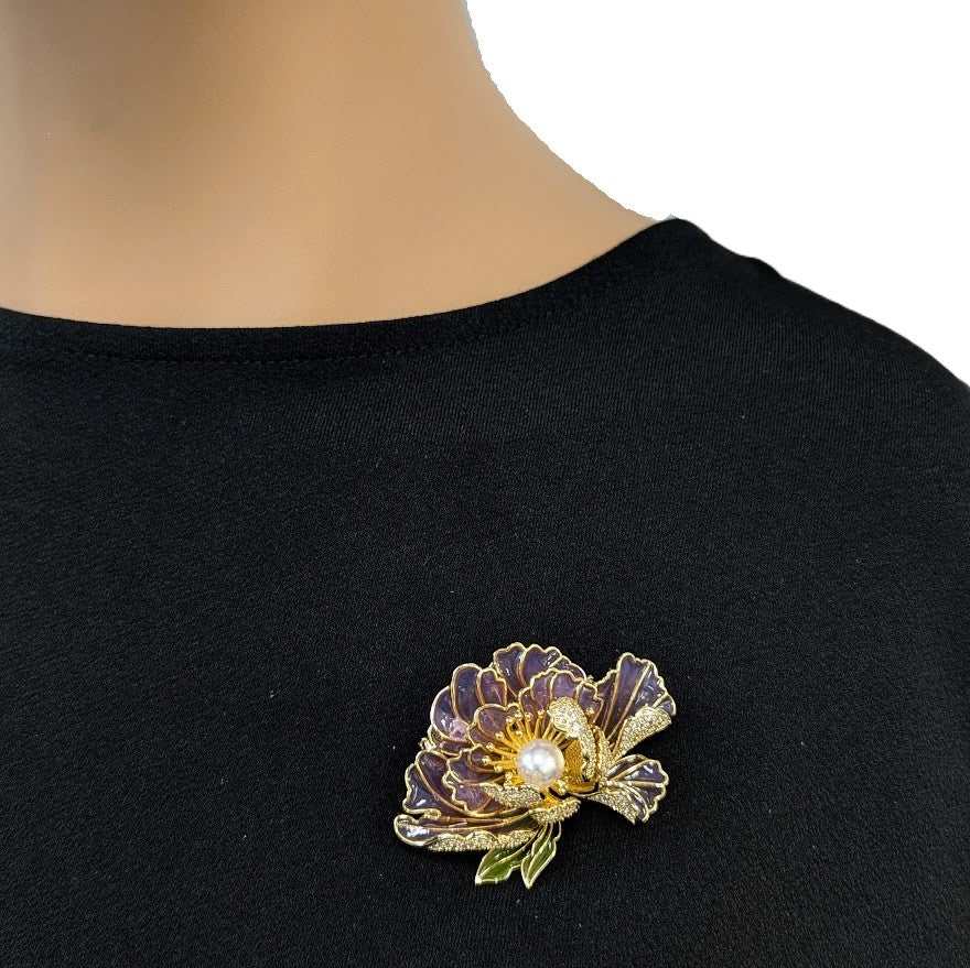 Gold plated flower freshwater pearl brooch with lilac enamel petals and cubic zirconia stones, featuring a 7mm button pearl