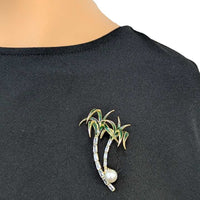 Gold-plated palm trees brooch with green enamel leaves, cubic zirconia, and 8mm freshwater pearl