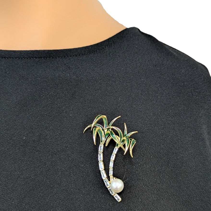 Gold-plated palm trees brooch with green enamel leaves, cubic zirconia, and 8mm freshwater pearl