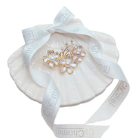 Flower Freshwater Pearl Brooch in gold-tone metal, with iridescent enamel flowers, round pearls and sparkling clear stones.