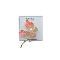 Flower Freshwater Pearl Brooch with pink enamel petals, central white pearl, sparkling clear stones and gold-tone stem details.