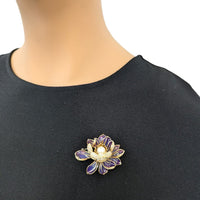 Flower Freshwater Pearl Brooch with purple enamel petals, gold-tone detailing, sparkling stones and a central white pearl.