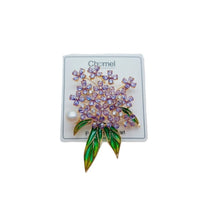 Flower Freshwater Pearl Brooch with purple faceted flower stones, green enamel leaves, and a single white pearl accent.
