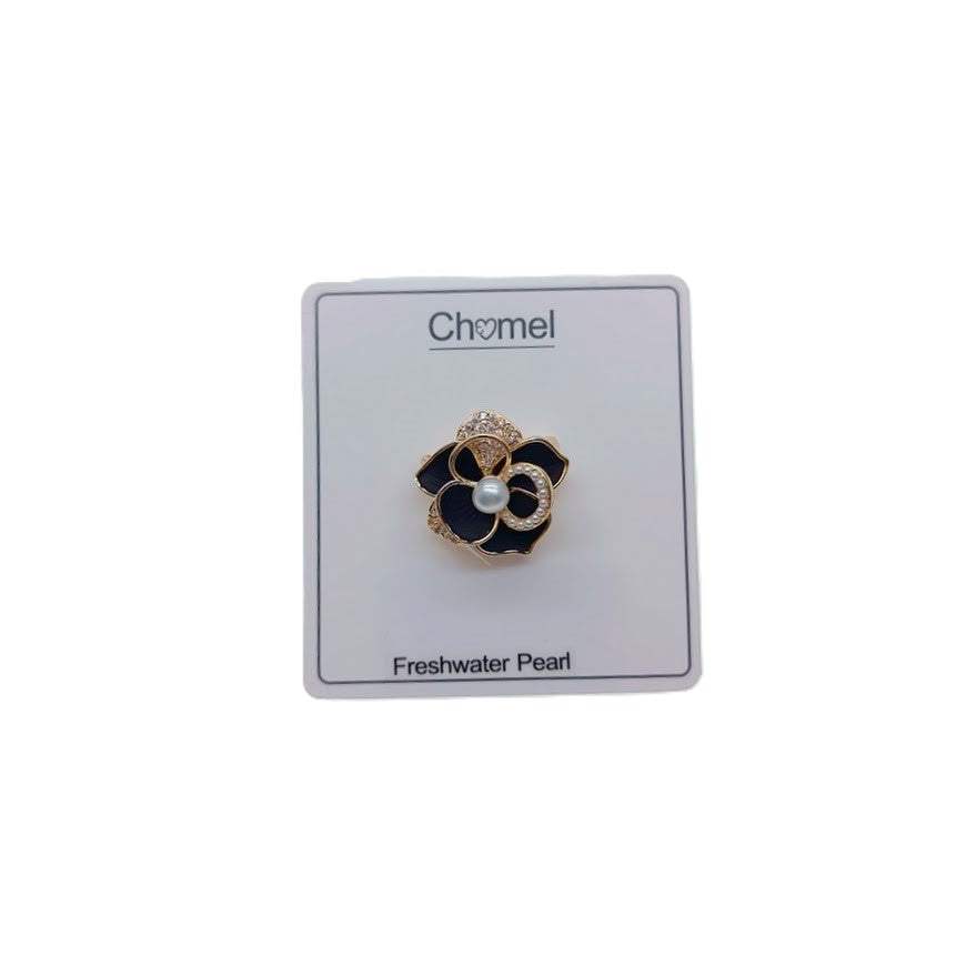 Gold plated flower freshwater pearl brooch with enamel petals and a central 4-5mm pearl, 2cm diameter.