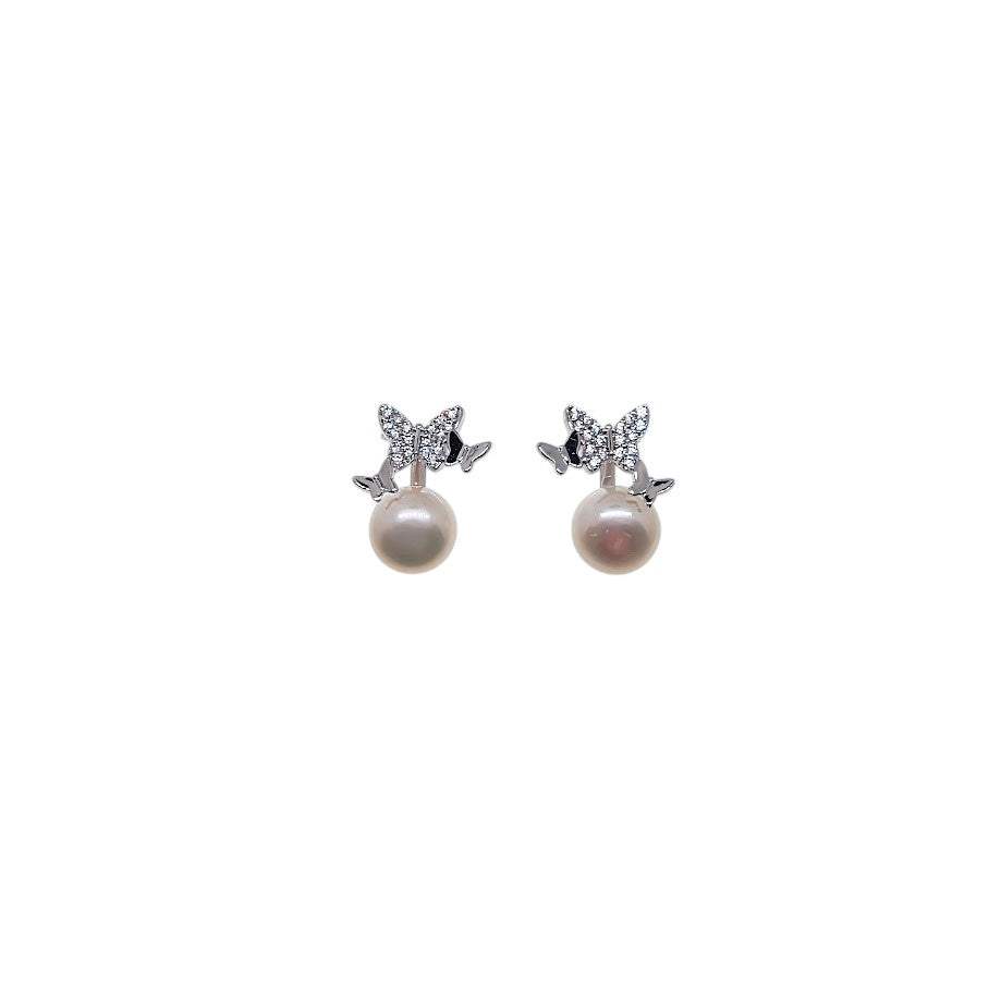 Freshwater pearl and cubic zirconia butterfly stud earrings with rhodium plating and 8mm button pearls