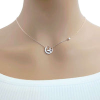 Moon and butterfly necklace with cubic zirconia and mother of pearl pendant on rosegold plated chain
