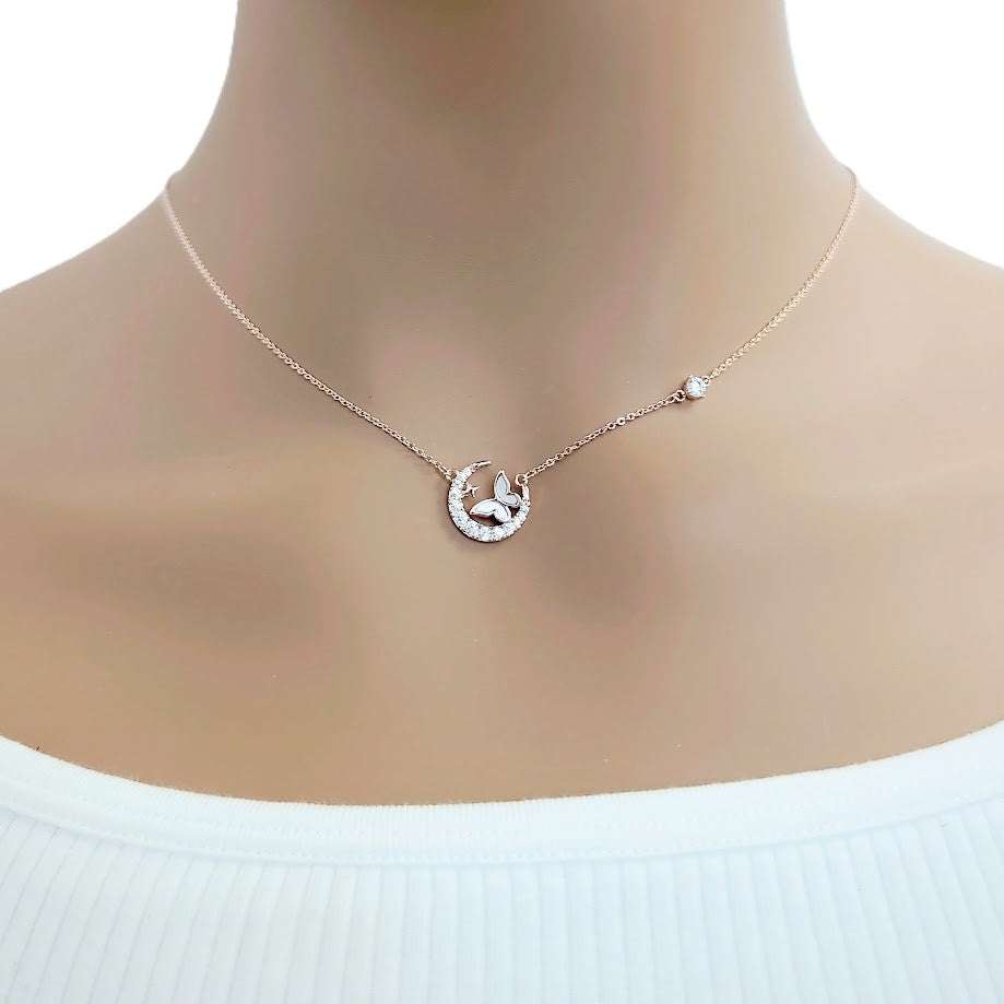 Moon and butterfly necklace with cubic zirconia and mother of pearl pendant on rosegold plated chain