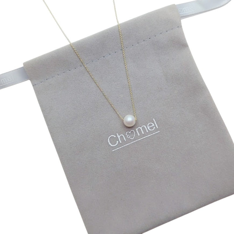 Freshwater Pearl Necklace featuring a single white pearl on a delicate gold-plated chain with an adjustable clasp.