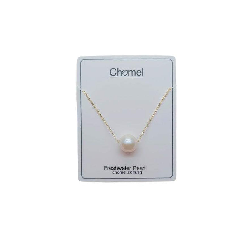 Freshwater Pearl Necklace with a single lustrous white pearl on a delicate gold plated chain displayed on a white card.