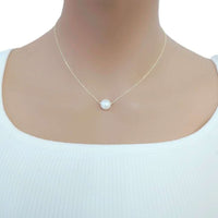 Freshwater Pearl Necklace with a single lustrous white pearl on a delicate gold-plated chain worn on the neck