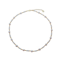Freshwater Pearl Necklace with roundish potato-shaped white pearls and gold-plated beads on a delicate wire choker.