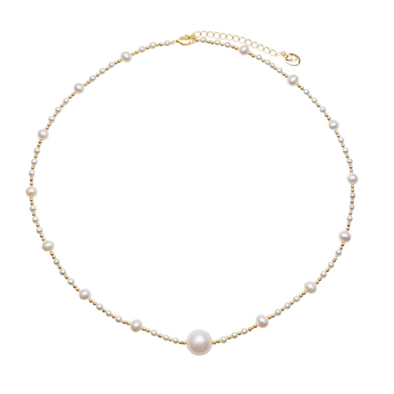 Freshwater Pearl Necklace featuring a large 11mm white pearl centerpiece with smaller roundish pearls and gold-plated beads on delicate wire.