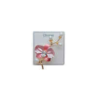 Flower Freshwater Pearl Brooch with pink petal flower, crystal centre and gold-tone twig adorned with white pearl-like drops.
