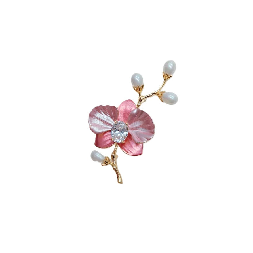 Flower Freshwater Pearl Brooch with pink enamel petals, a clear central crystal, and white teardrop pearls on a gold-tone twig.