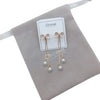 Ribbon Simulated Pearl Stud Earrings - CHOMEL