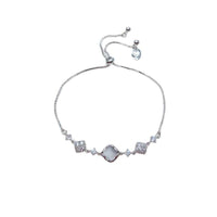 Cubic Zirconia Tennis Bracelet in silver-tone metal with a diamond-shaped simulated moonstone centre and sparkling accents