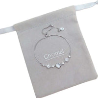 Cubic Zirconia Tennis Bracelet in silver-tone metal with square gemstone centerpiece and sparkling accents, adjustable chain