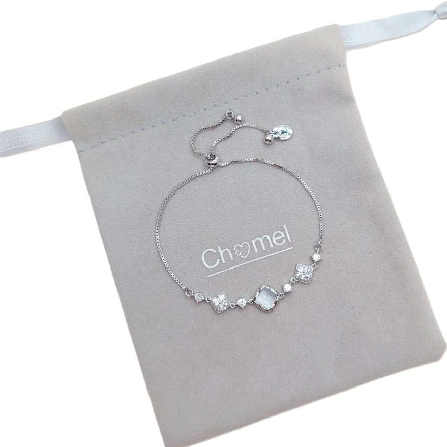 Cubic Zirconia Tennis Bracelet in silver-tone metal with square gemstone centerpiece and sparkling accents, adjustable chain