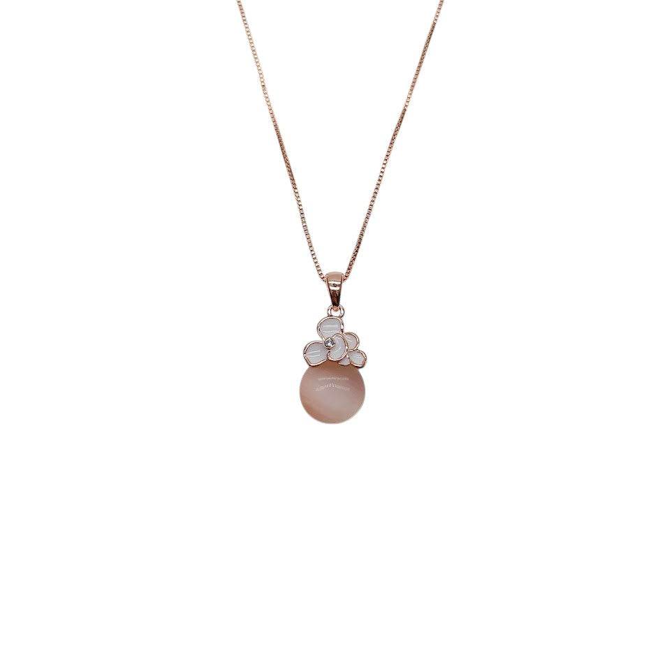 Teardrop simulated moonstone pendant necklace with white enamel and rosegold plating