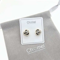 Black enamel flower cubic zirconia stud earrings with gold plated finish and hypoallergenic posts