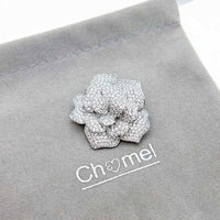 Flower cubic zirconia brooch with rhodium plating and C clasp closure, 3.8cm diameter