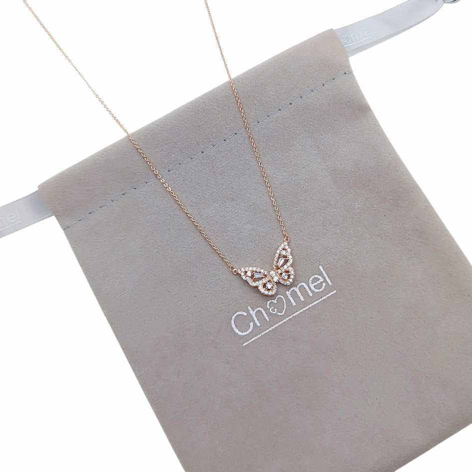Butterfly cubic zirconia pendant on rosegold adjustable chain necklace